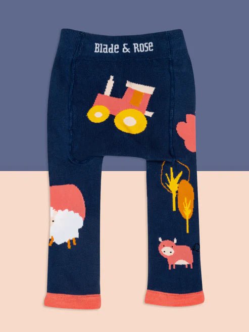 Navy leggings with farm animal and tractor design on a two-tone background