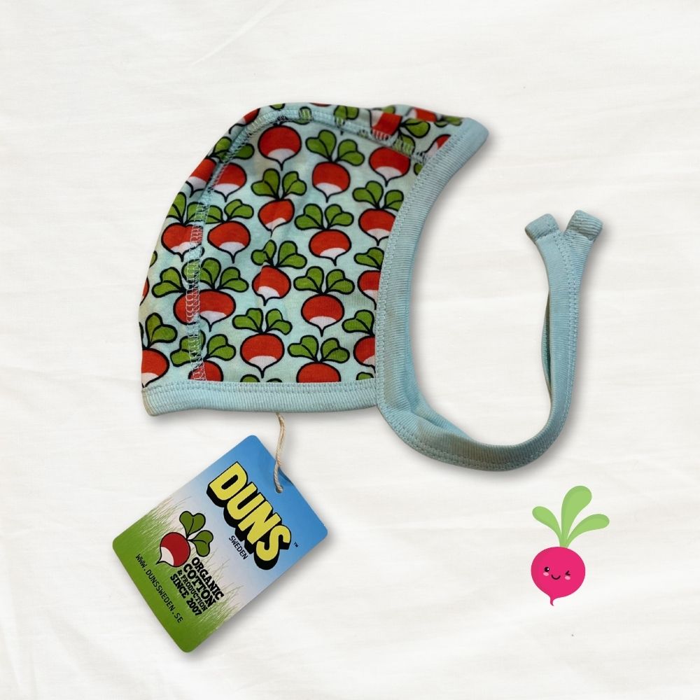 Baby hat with radish pattern and Duns brand tag on a white background