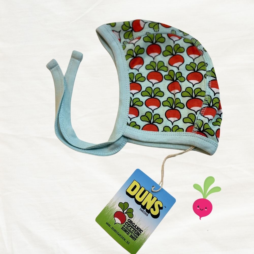 Baby hat with radish pattern and Duns brand tag on a white background