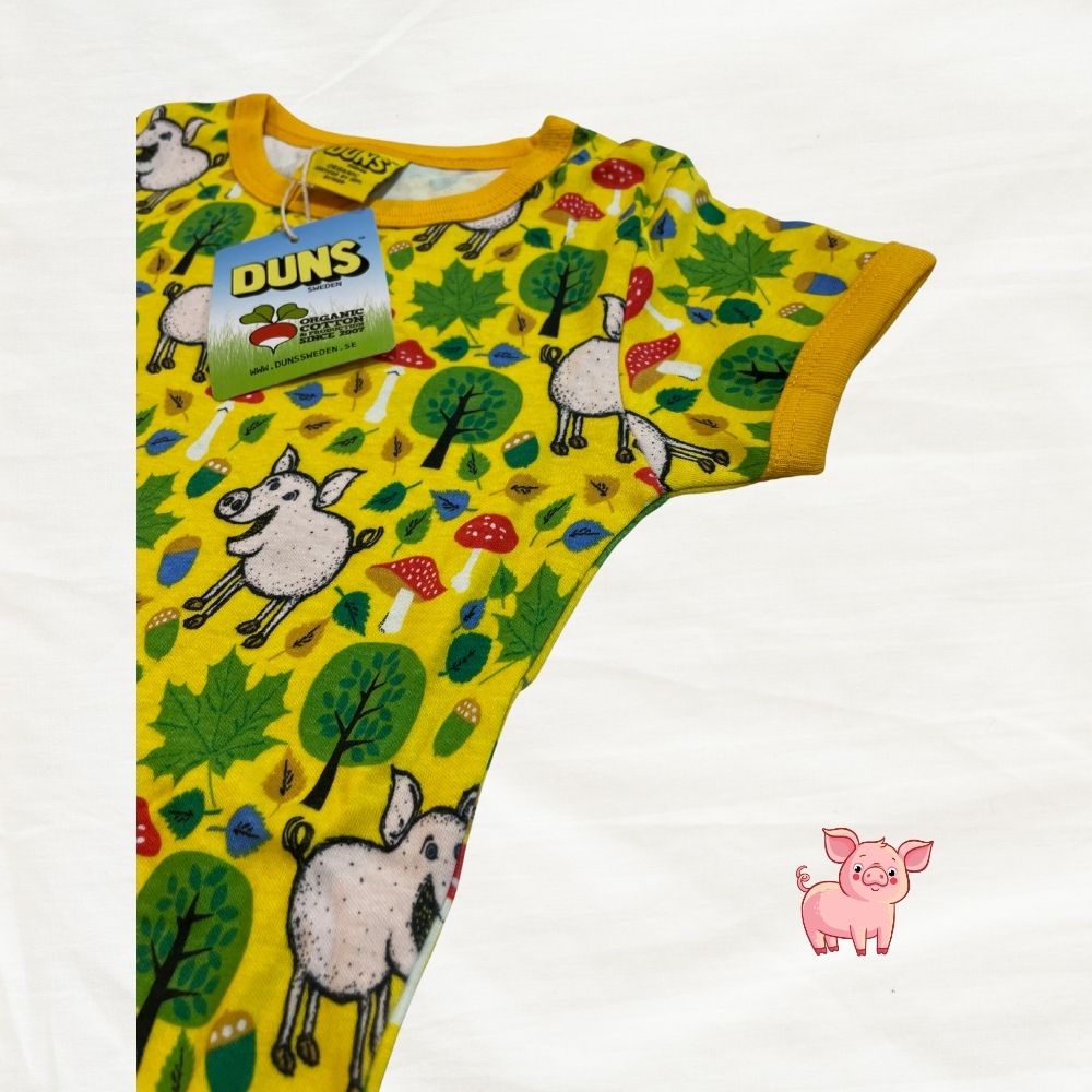 Yellow children's t-shirt with animal pattern on a white background