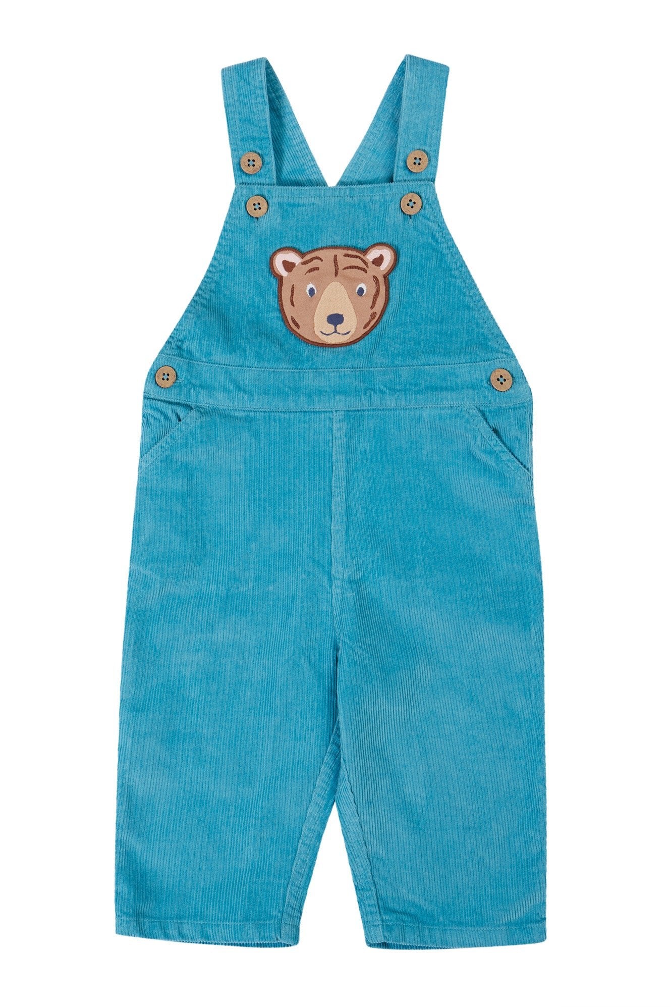 Blue children's overalls with a bear face patch on a white background