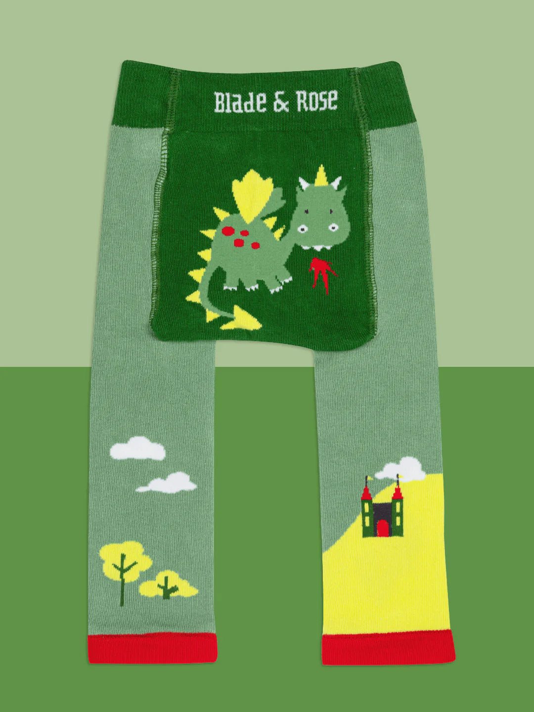 Children's leggings with dinosaur design and 'Blade & Rose' branding on a green background