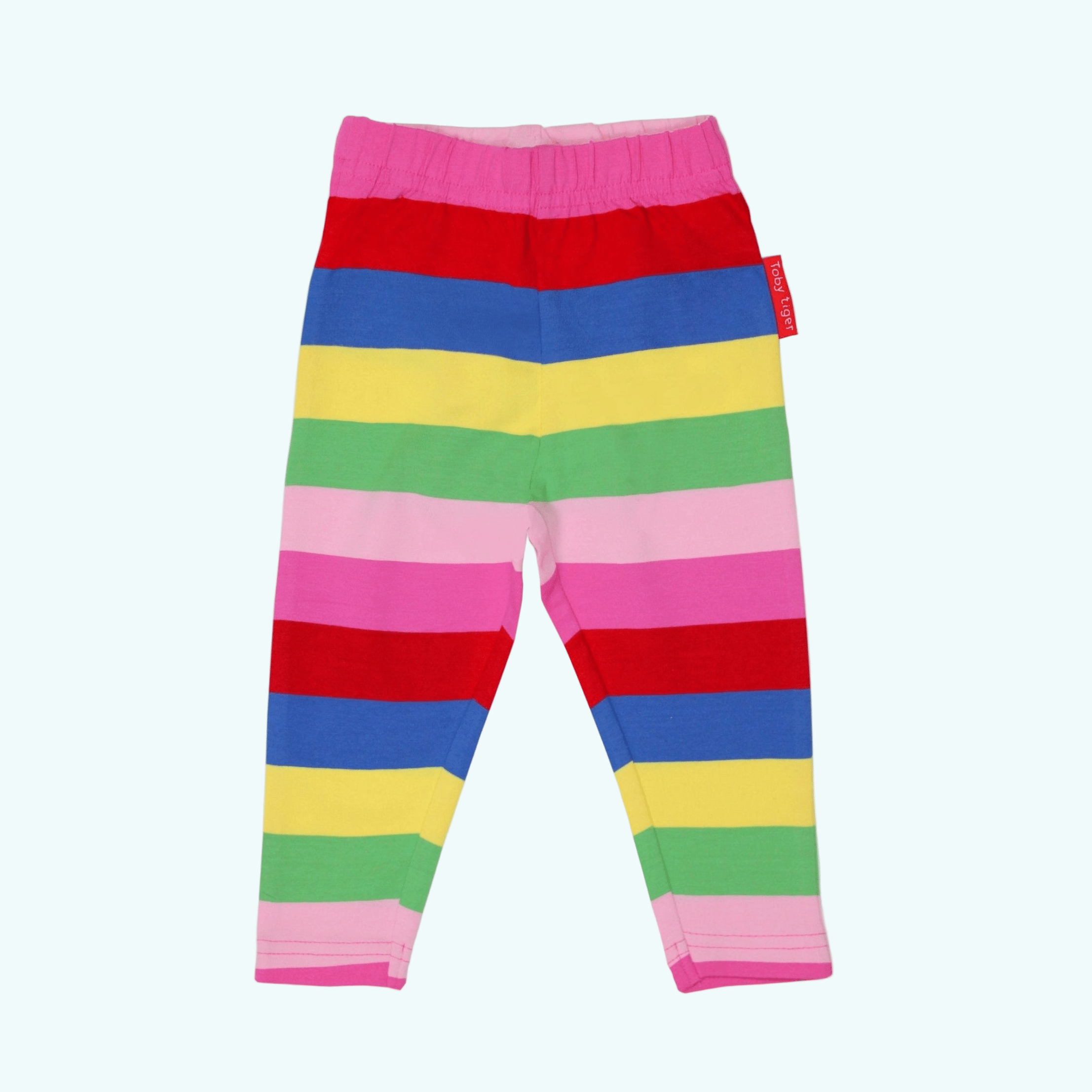 Orange children's swimsuit with blue whale patterns on a white background