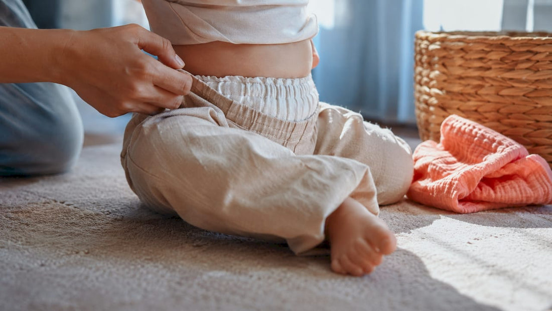Roomy baby clothing over a cloth nappy