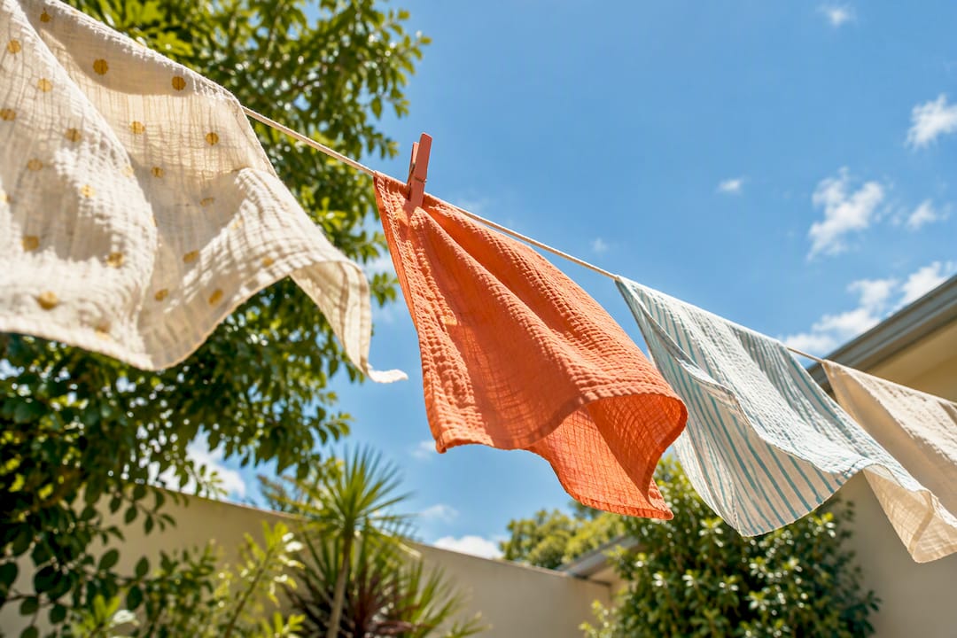 Fabric drying outdoors in warm sunlight