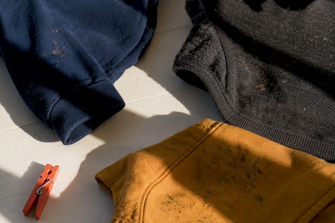 Dark and patterned kids clothing hiding everyday marks