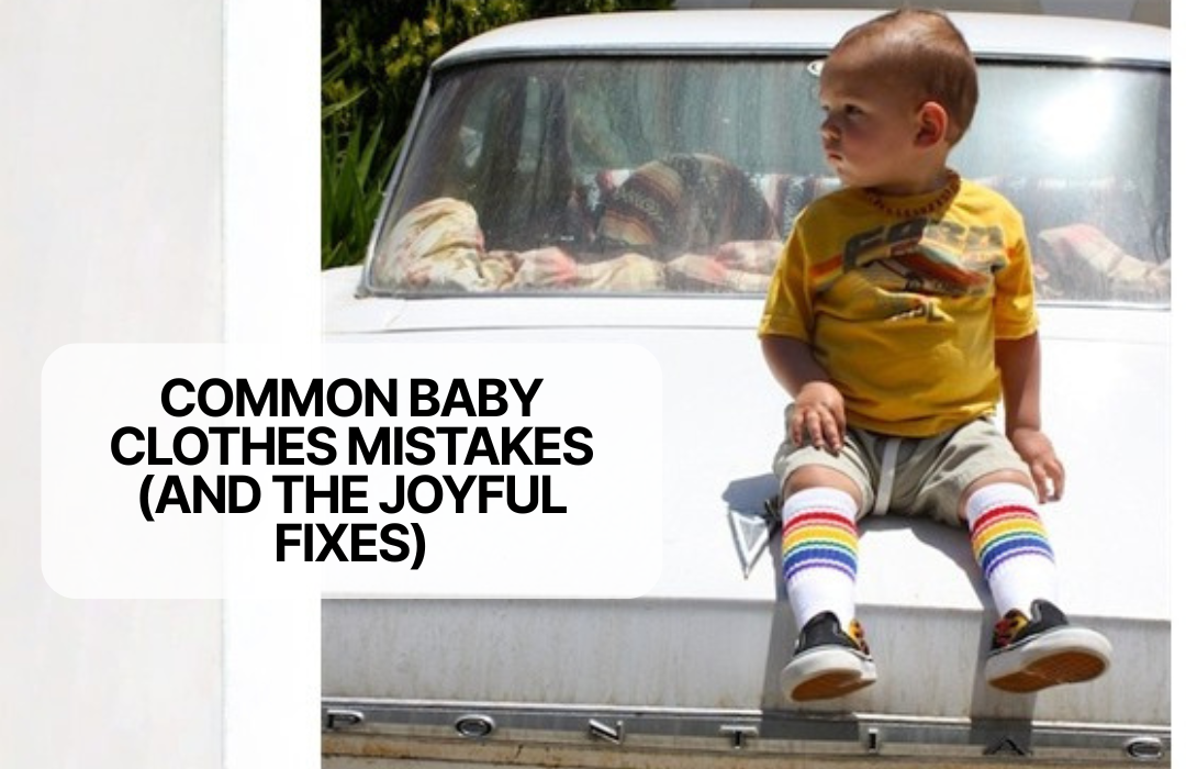 A young boy sitting on a car with colourful socks on