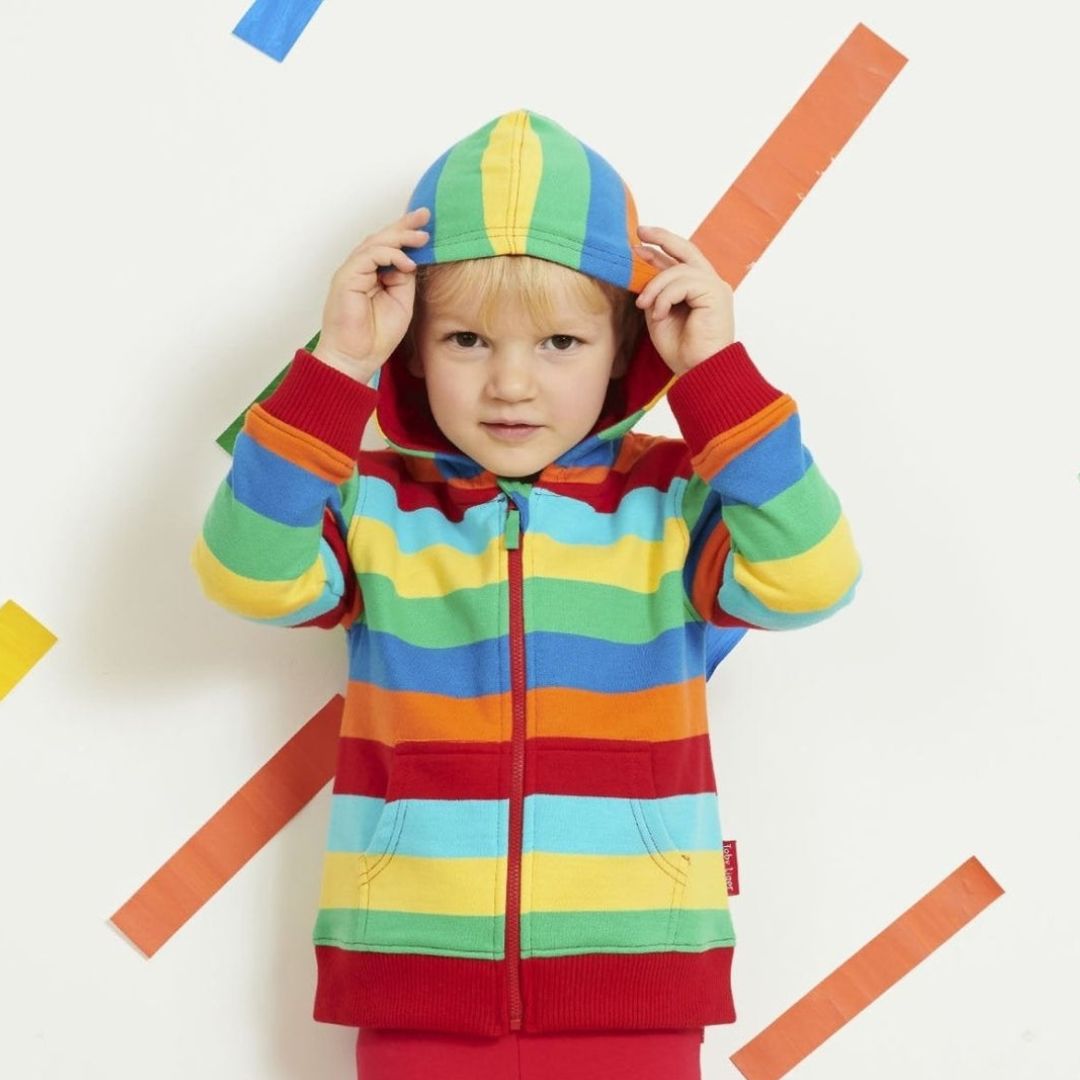 Boy in rainbow stripped hoodie