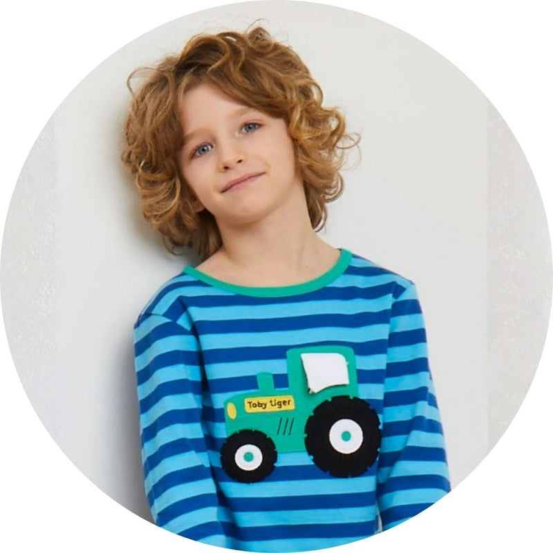 Boy wearing tractor top from Toby Tiger