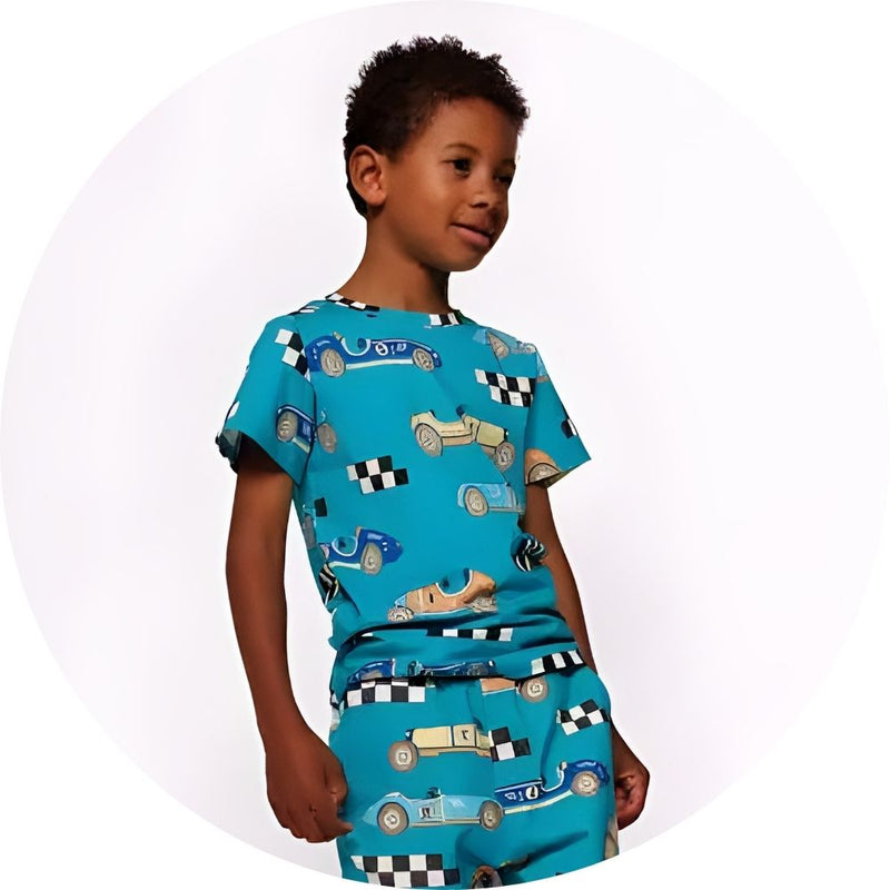 Boy wearing racing car outfit from Smafolk