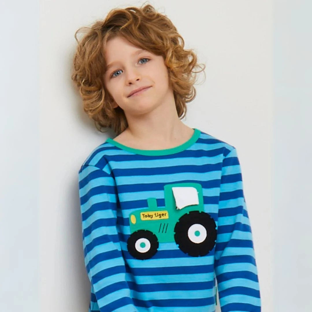 Boy wearing tractor shirt