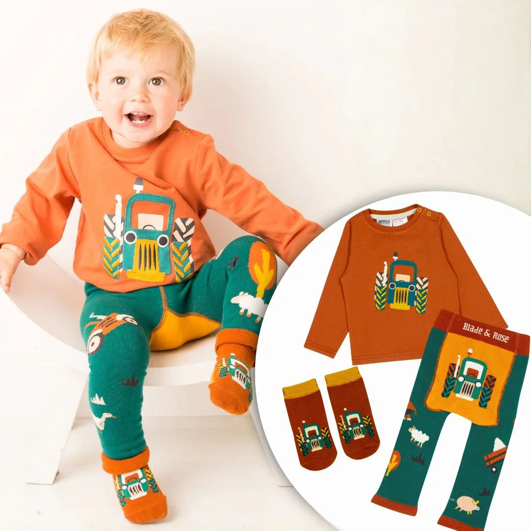 Child wearing an orange and green outfit with a matching set displayed.