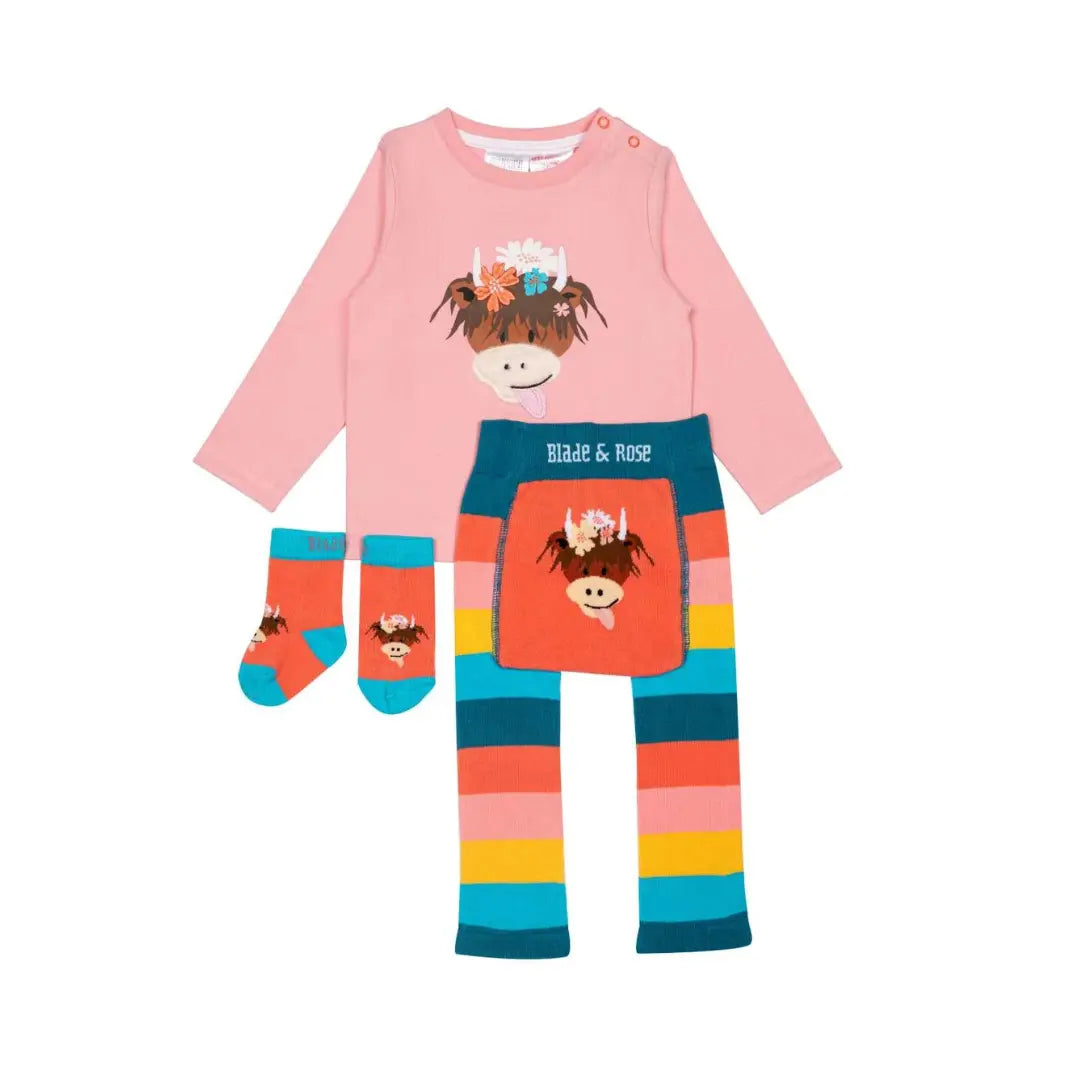 A toddler girl's three-piece knit outfit set featuring a light pink long-sleeve top with a cowgirl graphic, matching striped leggings with a cowgirl patch pocket, and coordinating striped socks.