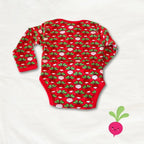 Red baby onesie with pink and green pattern on a white background