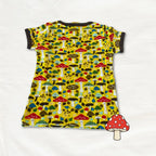 Children's dress with colorful mushroom pattern on a white background
