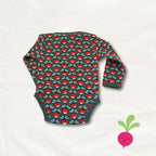 Baby onesie with red and green pattern on a white background