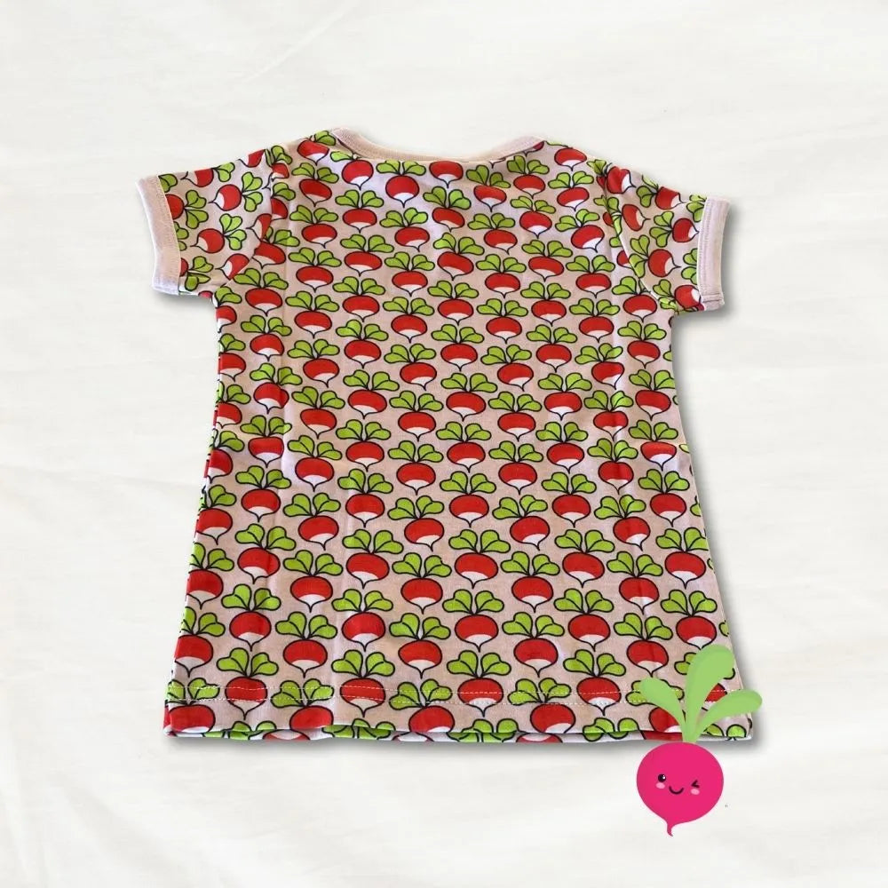 Children's dress with radish pattern on a white background