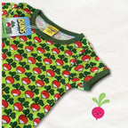 Green baby romper with red and white pattern on a white background