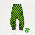 Green baby romper with clover pattern on a white background