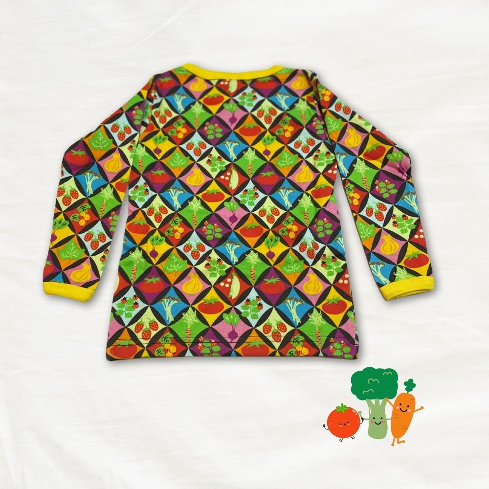 Colorful patterned shirt with vegetable design on a white background