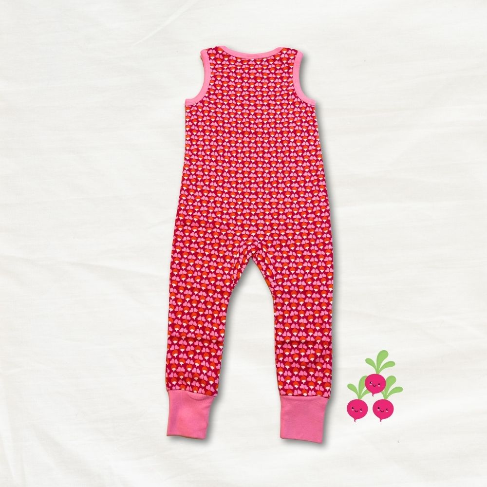 Red children's romper with radish accents on a white background