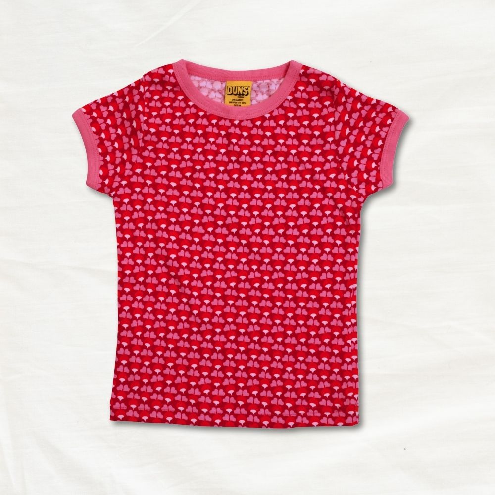 Red t-shirt with pink trim on a white background