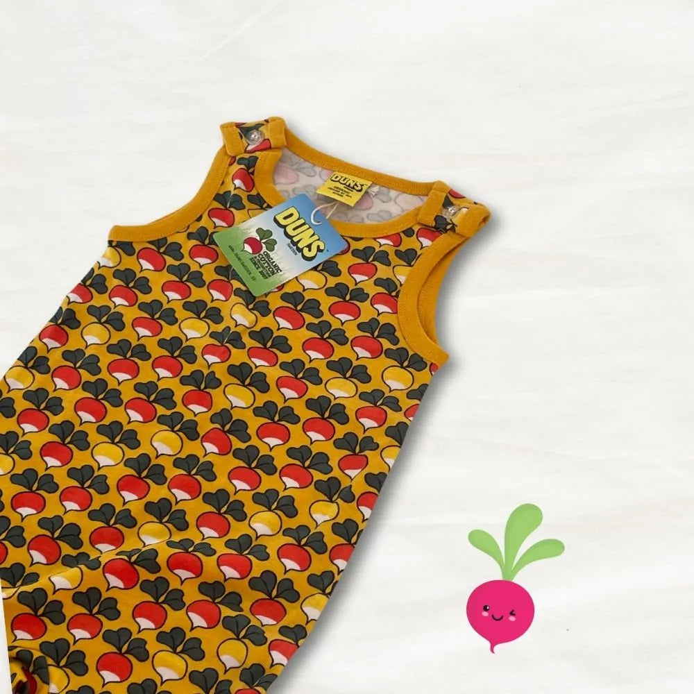 Yellow sleeveless dress with heart pattern on a white background