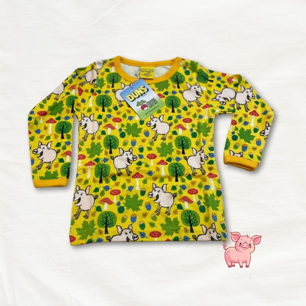 Children's long-sleeve shirt with farm animal pattern on a white background