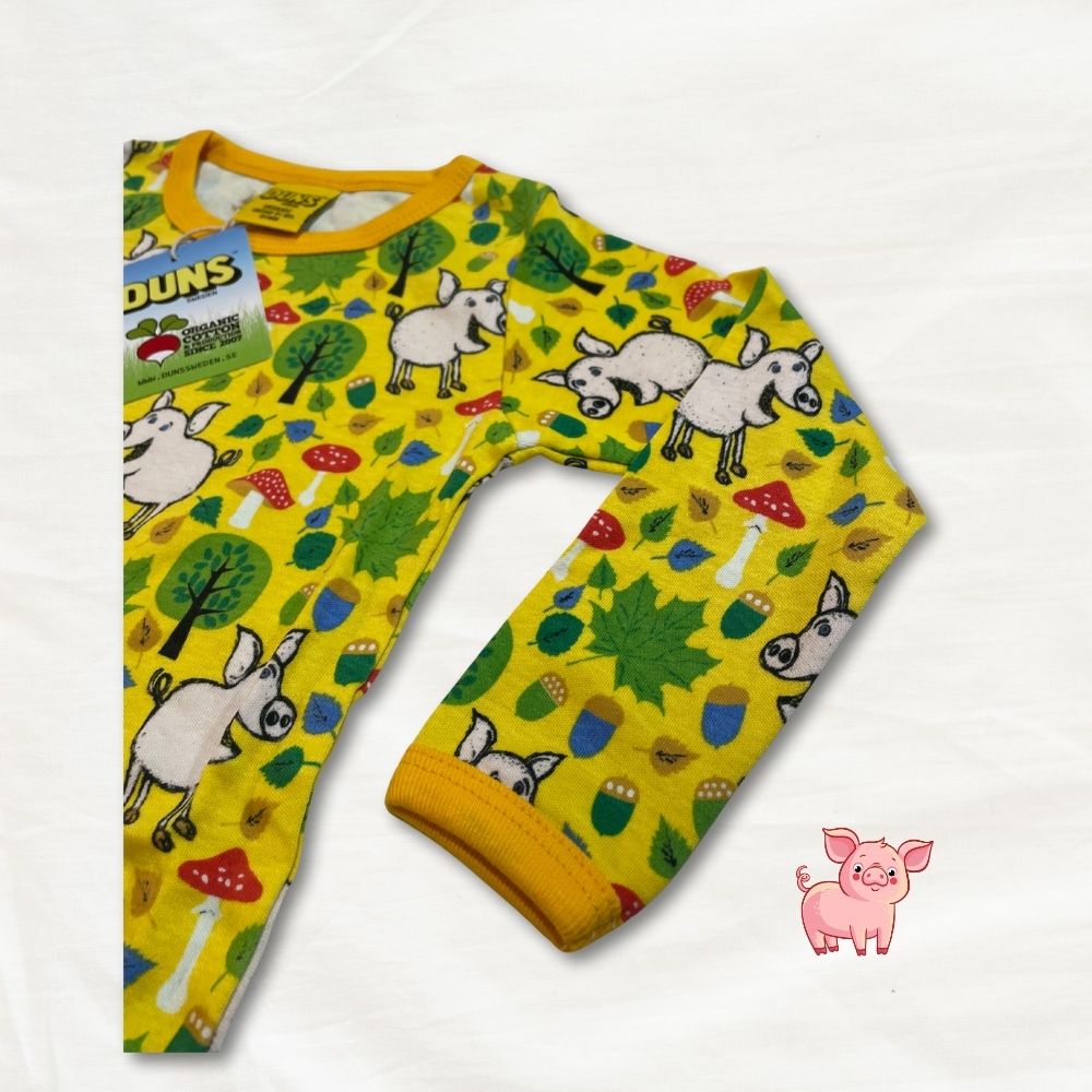 Yellow children's leggings with animal pattern on a white background