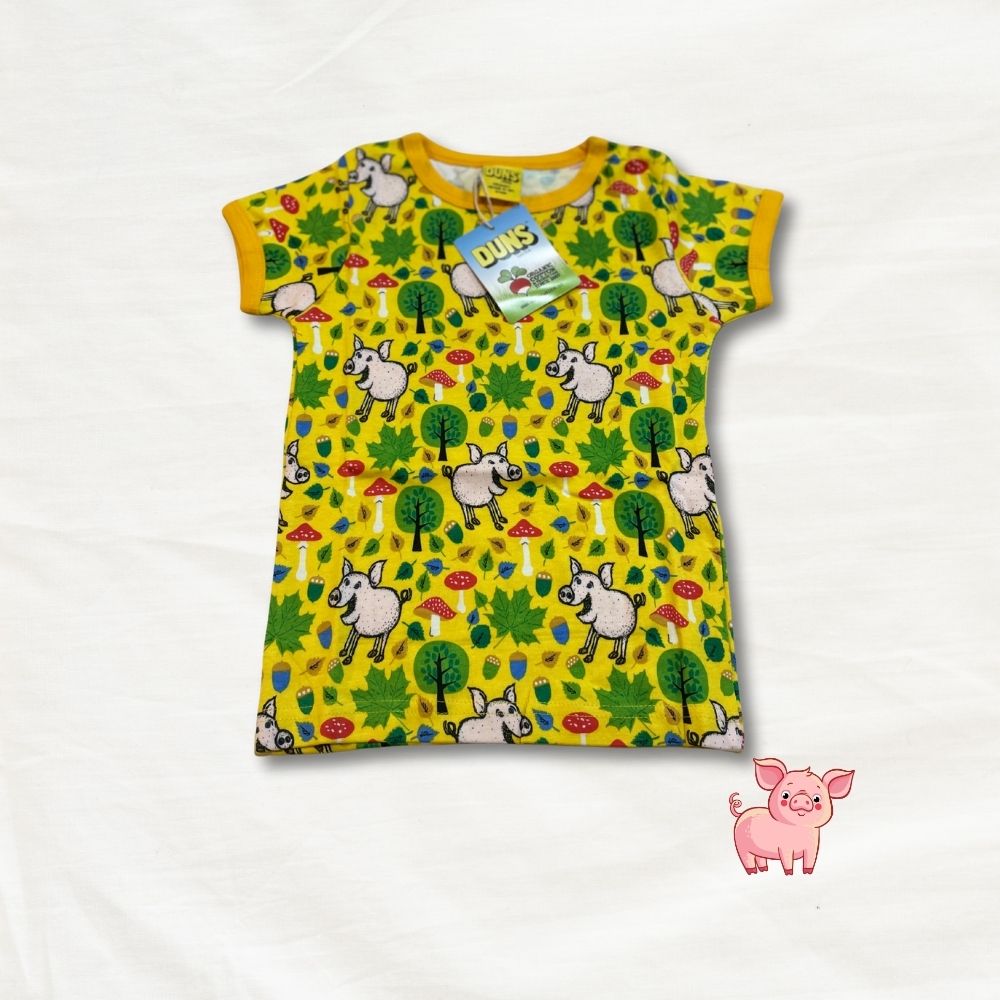 Children's t-shirt with pig pattern on a white background