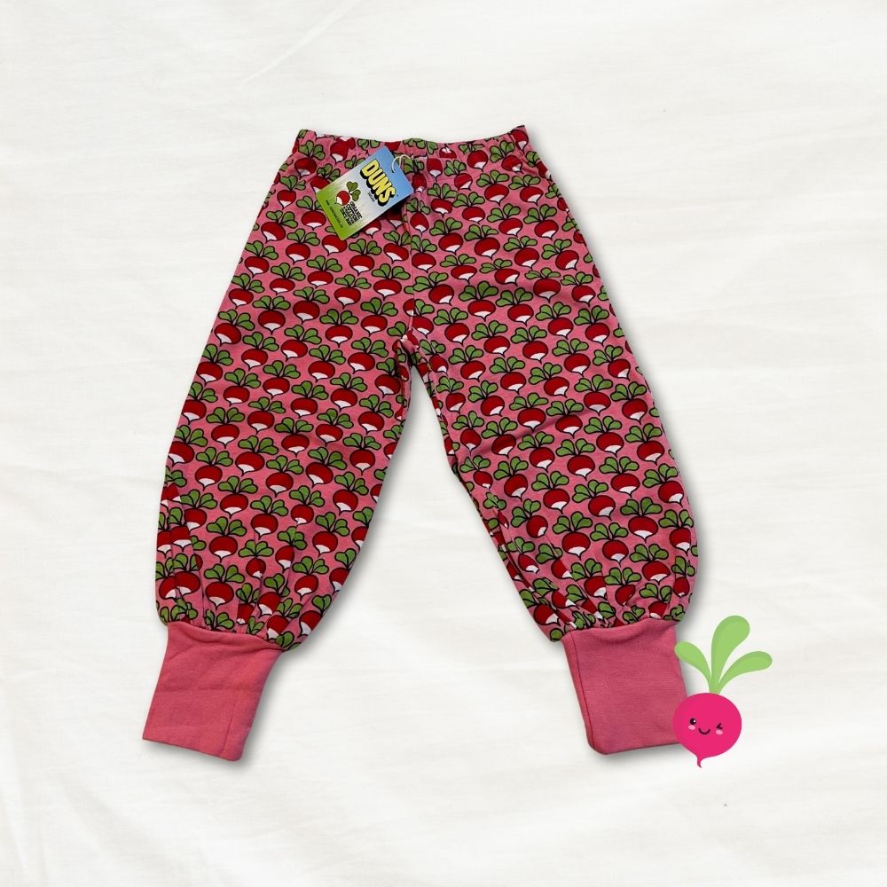 Children's baggy pants with radish pattern on a white background
