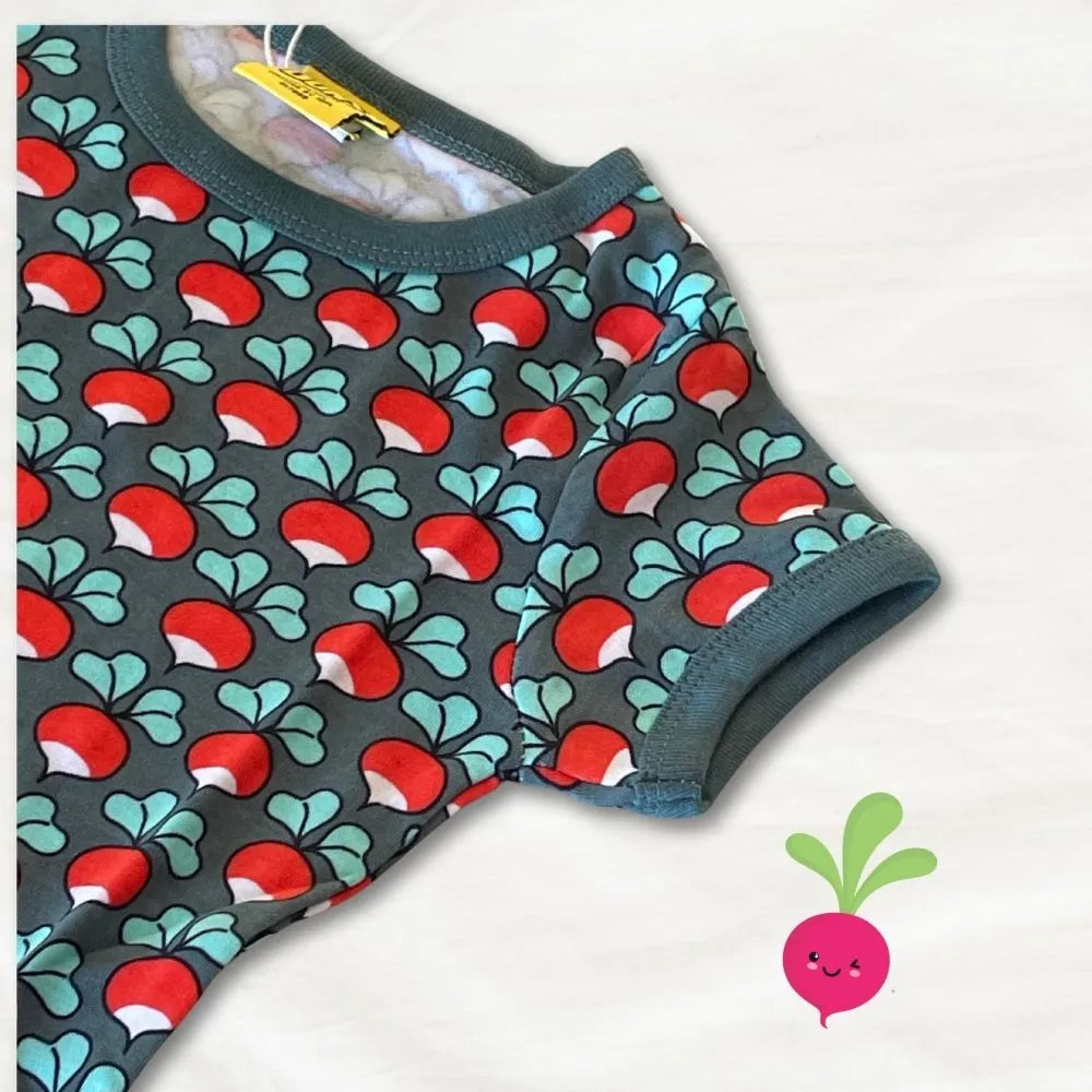 Children's tank top with red and green pattern on a white background