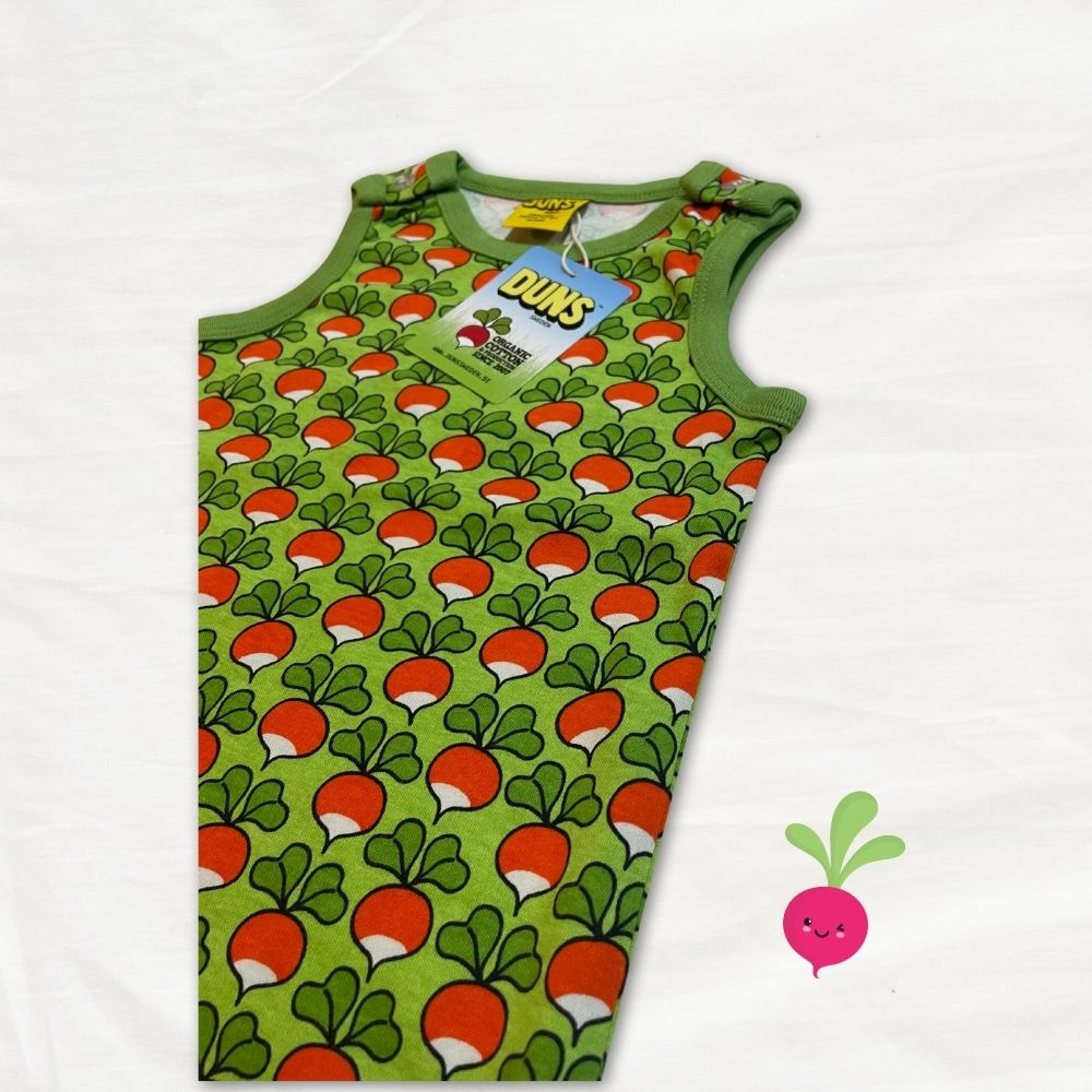 Green dungarees with radish pattern on a white background