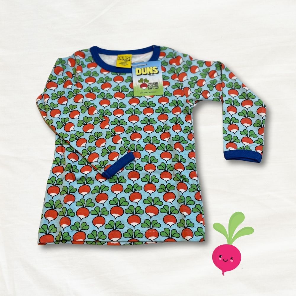 Children's long-sleeve shirt with radish pattern on a white background