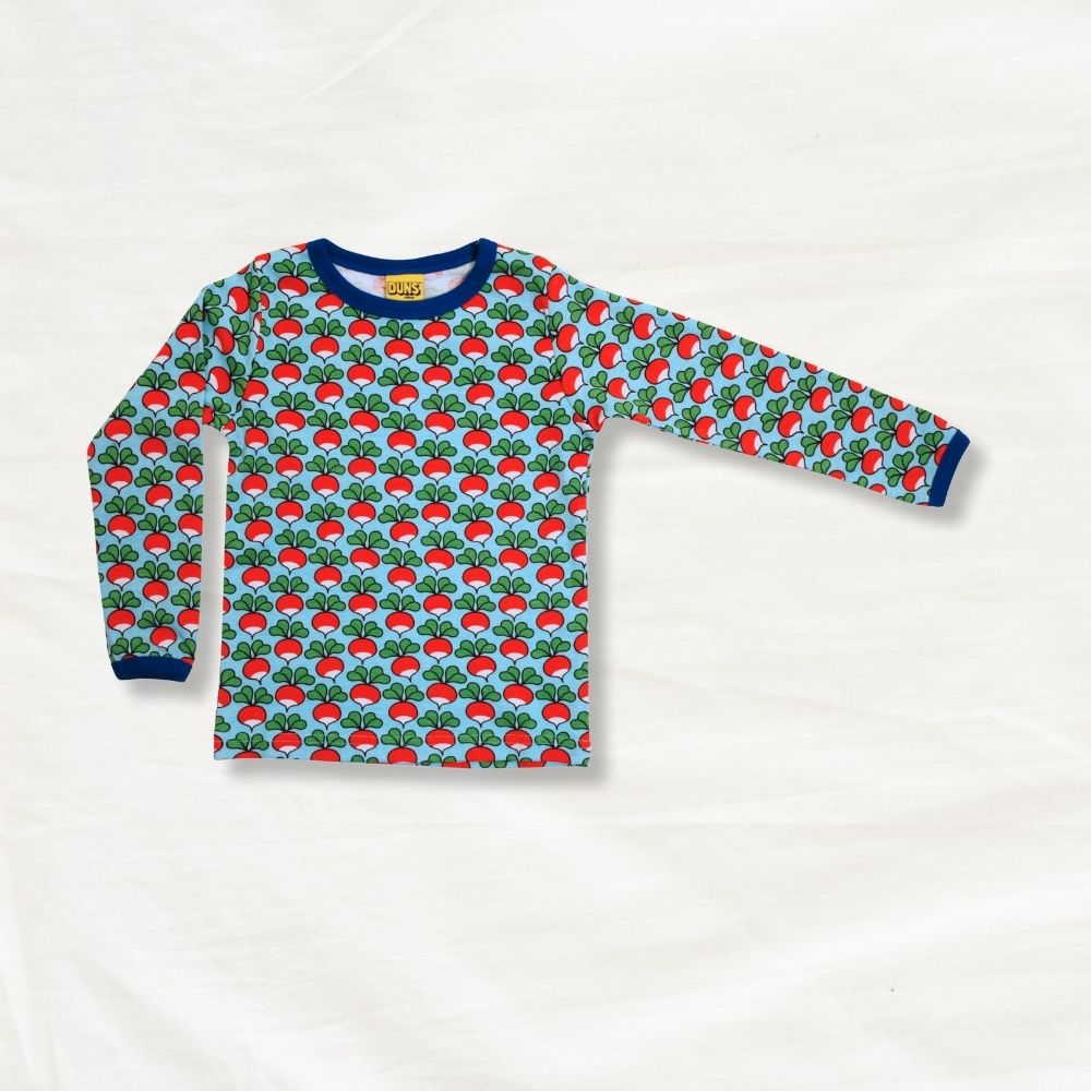 Long-sleeve shirt with radish pattern on a white background