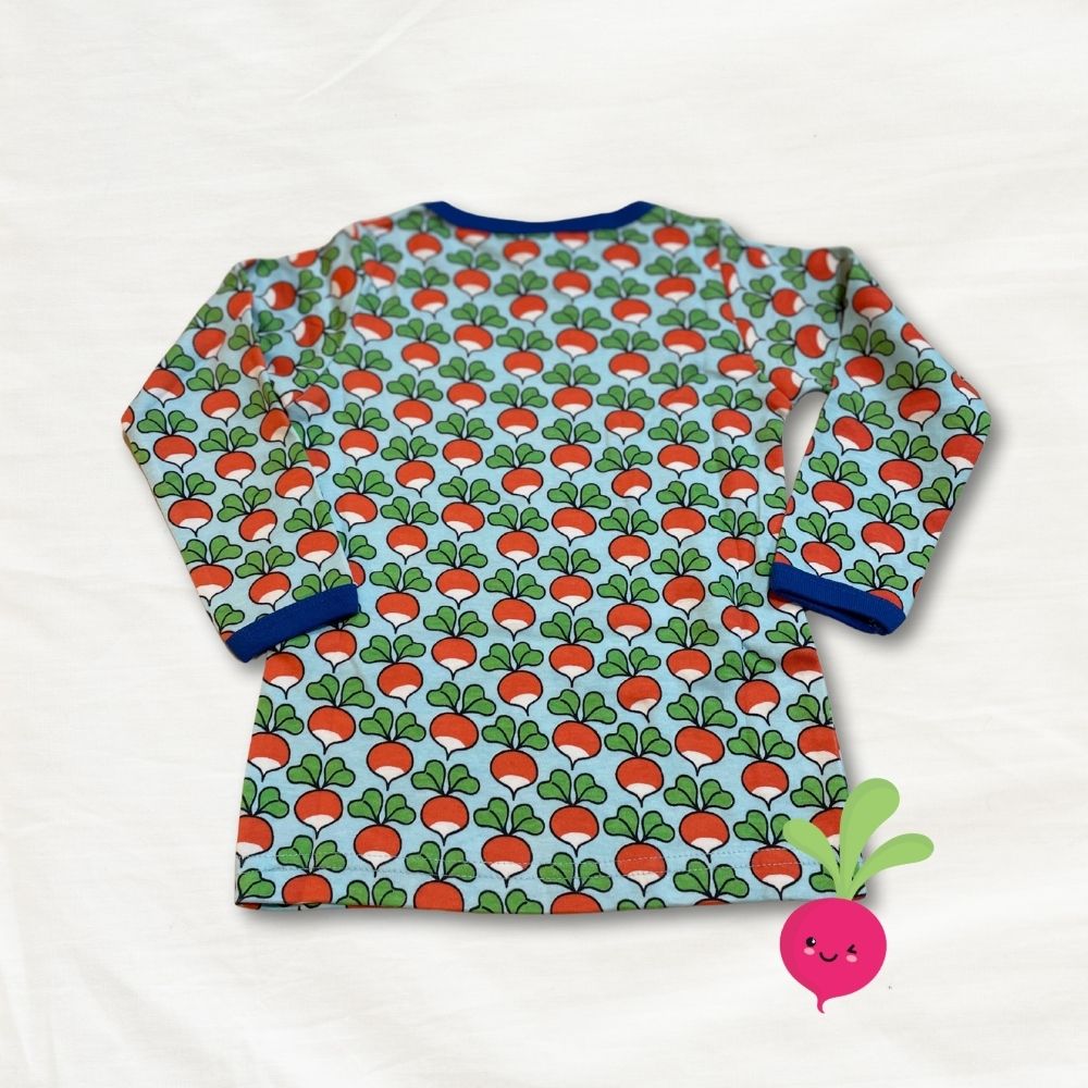 Children's long-sleeve shirt with radish pattern on a white background