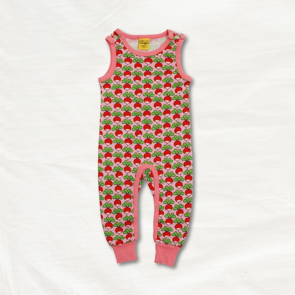 Children's romper with radish pattern on a white background