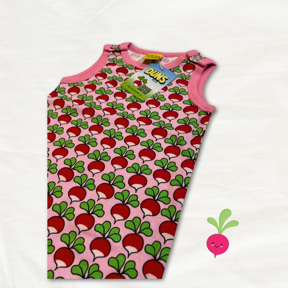 Children's sleeveless dungarees with radish pattern on a pink background