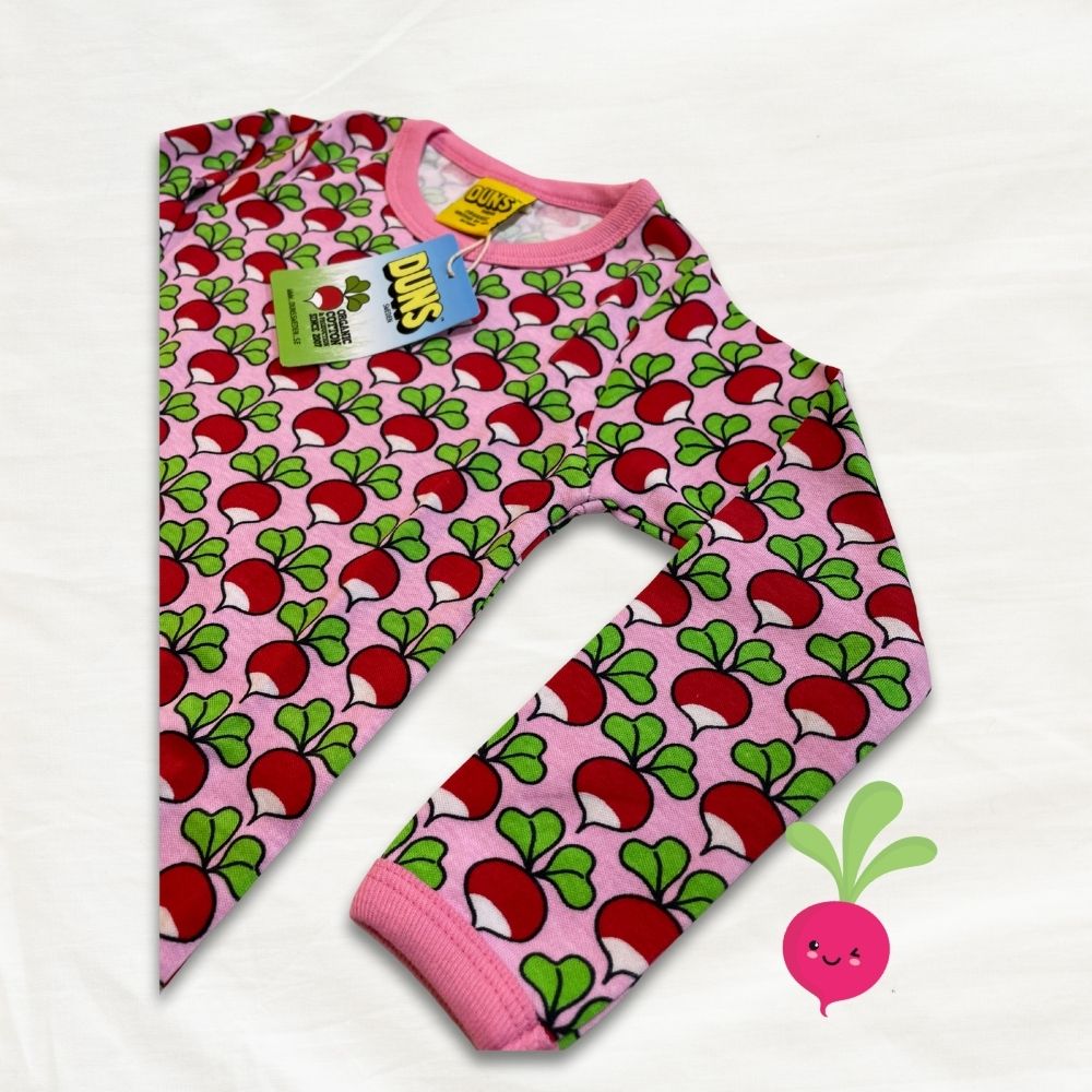 Children's top with radish pattern on a white background