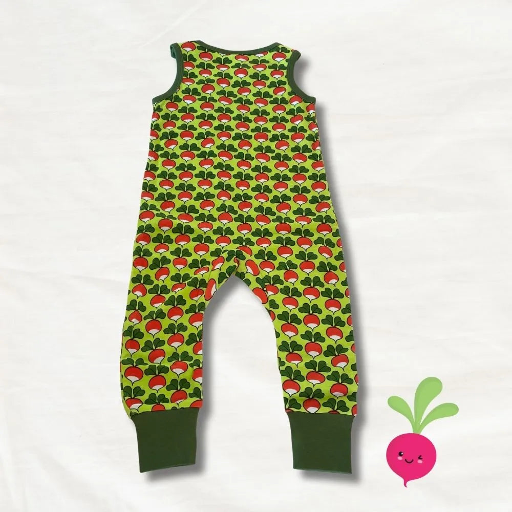 Children's sleeveless romper with mushroom pattern on a white background