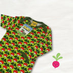 Green baby romper with red and white pattern, featuring a 'Duns' brand tag on a white background.