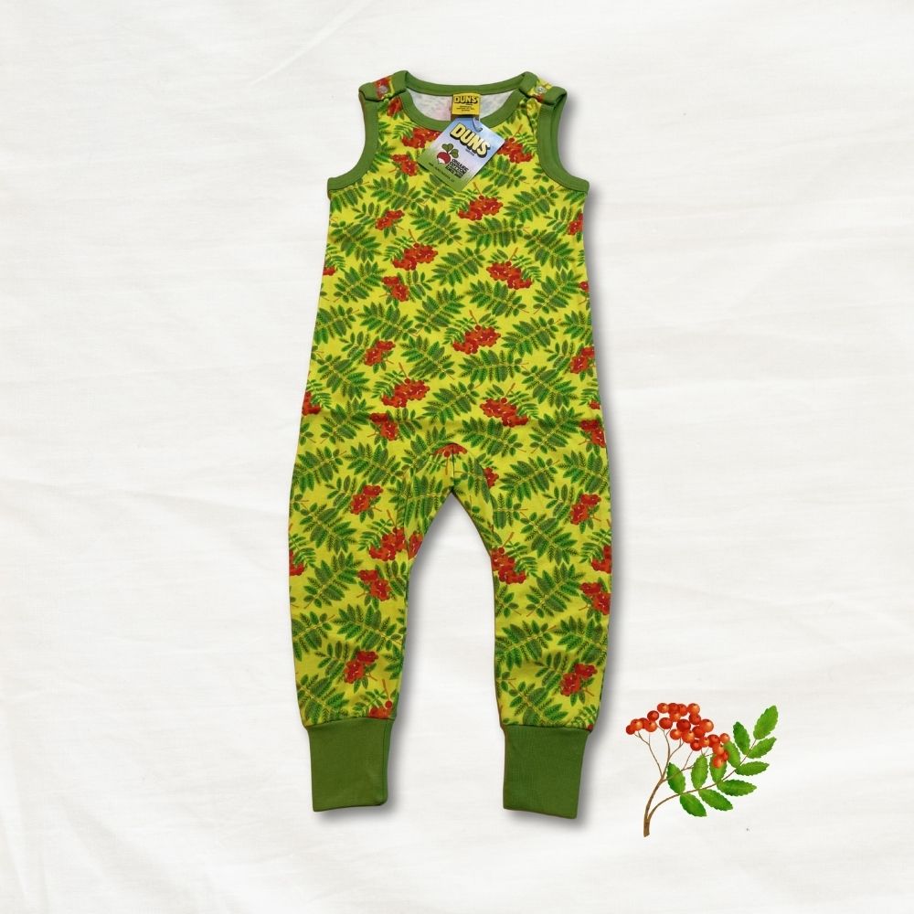 Children's sleeveless romper with leaf and berry pattern on a white background