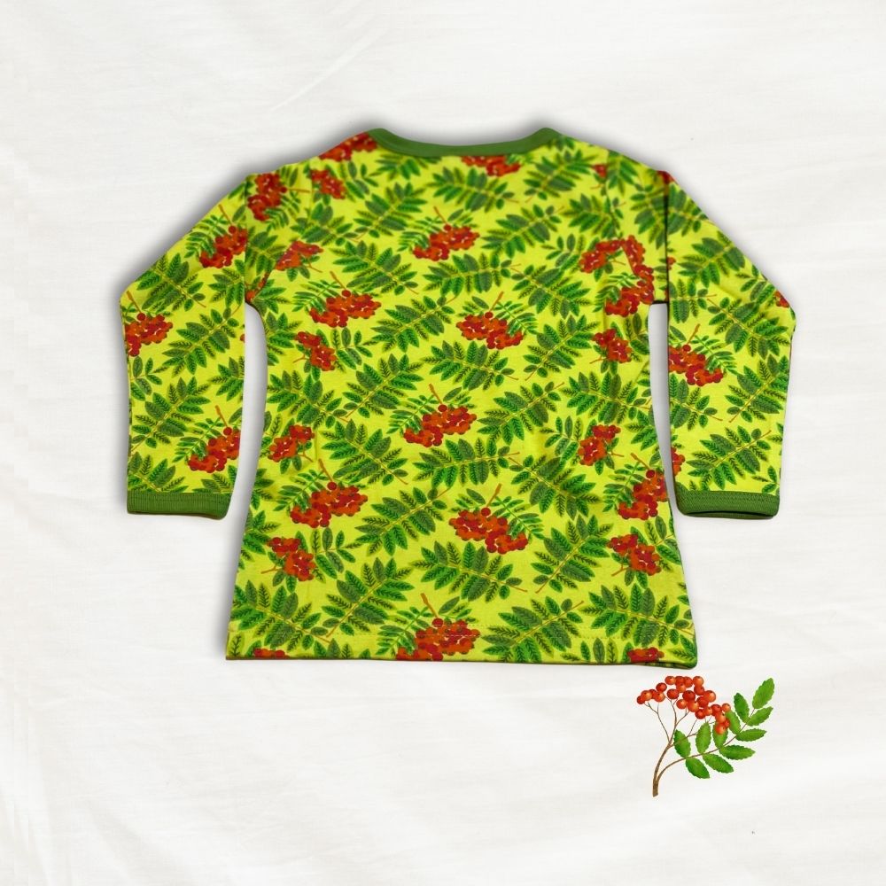Long-sleeve shirt with a green leaf and red berry pattern on a white background