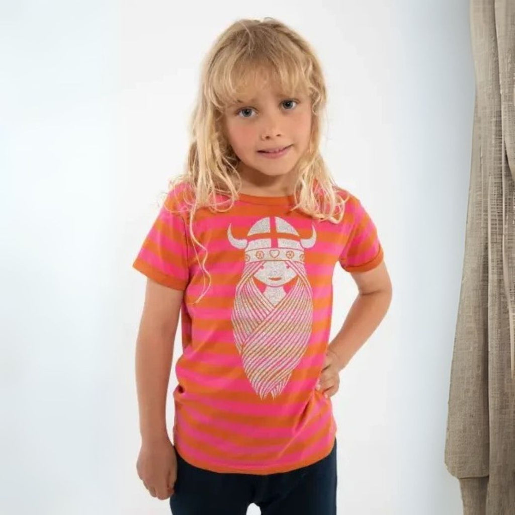 Child wearing a pink and orange striped t-shirt with a graphic design on a white background