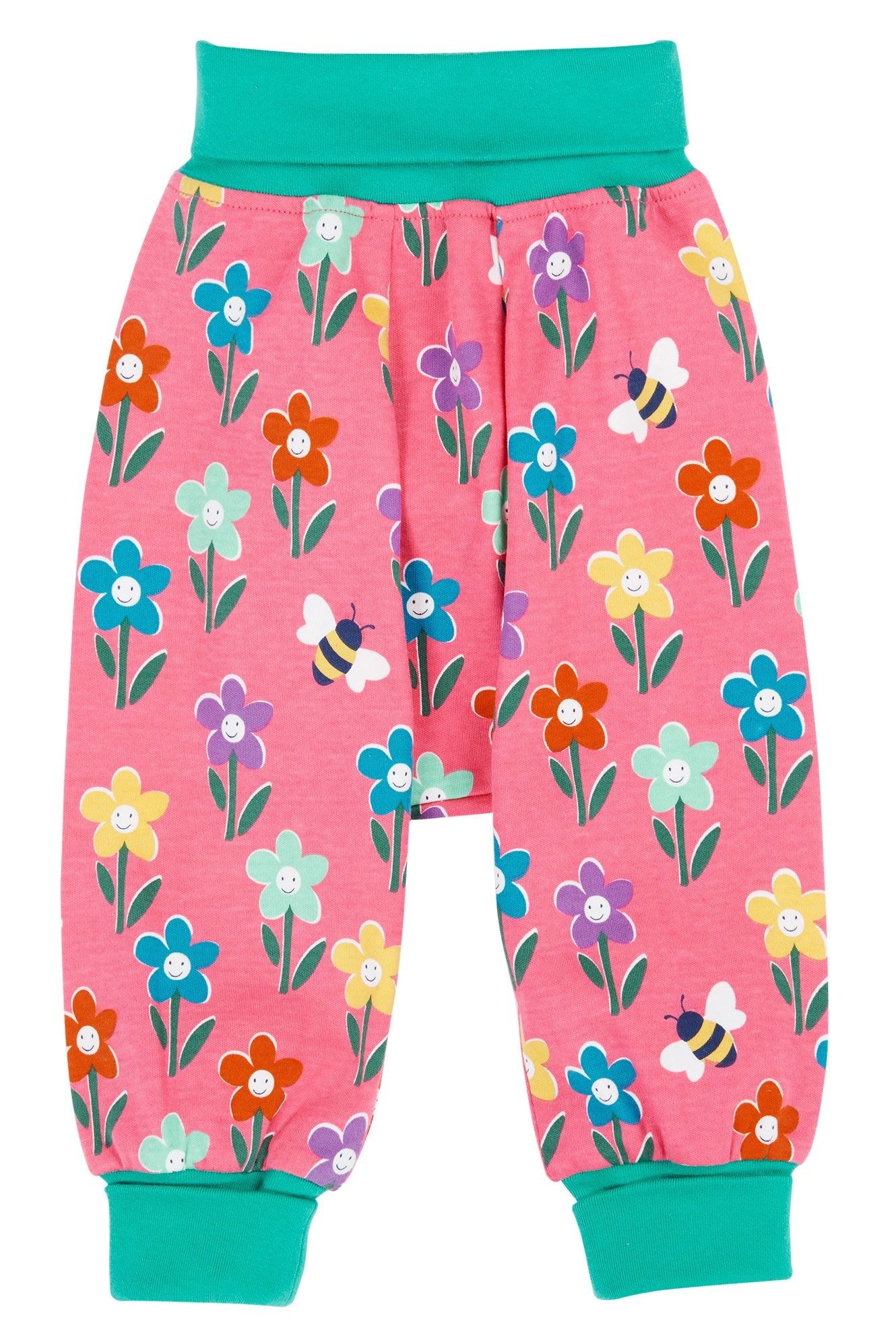 Children's pink pants with floral and bee pattern on a white background