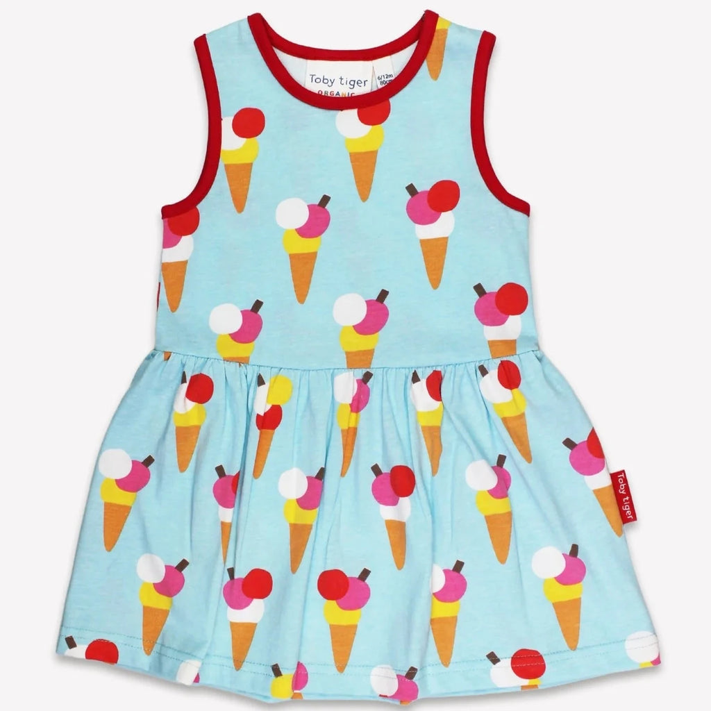 Children's dress with ice cream cone pattern on a light blue background