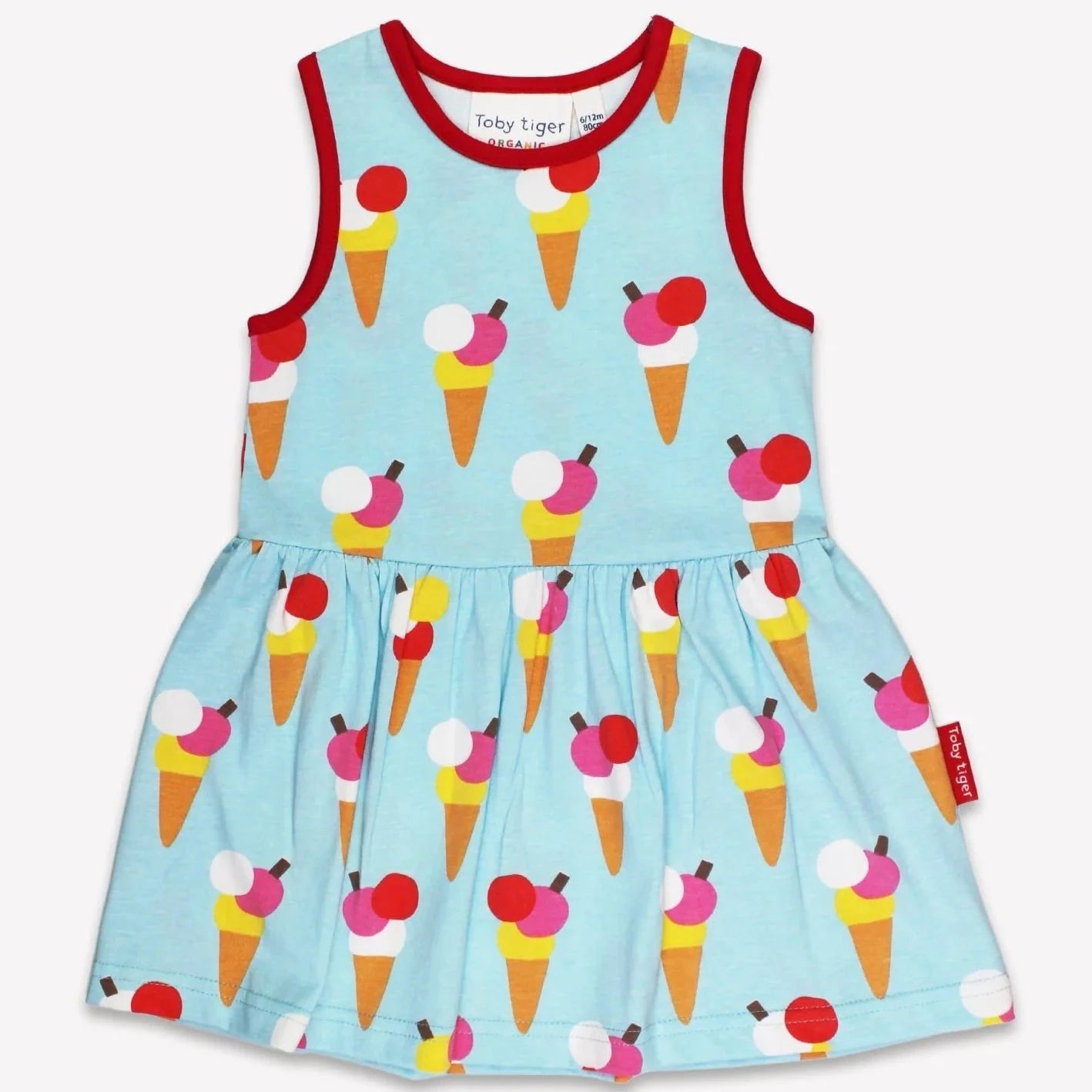 Children's dress with ice cream cone pattern on a light blue background