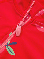 Close up of a red long sleeve kite swimsuit