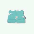 Teal baby hat with bear ears and animal prints on a white background