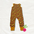 Children's sleeveless romper with mushroom pattern on a white background